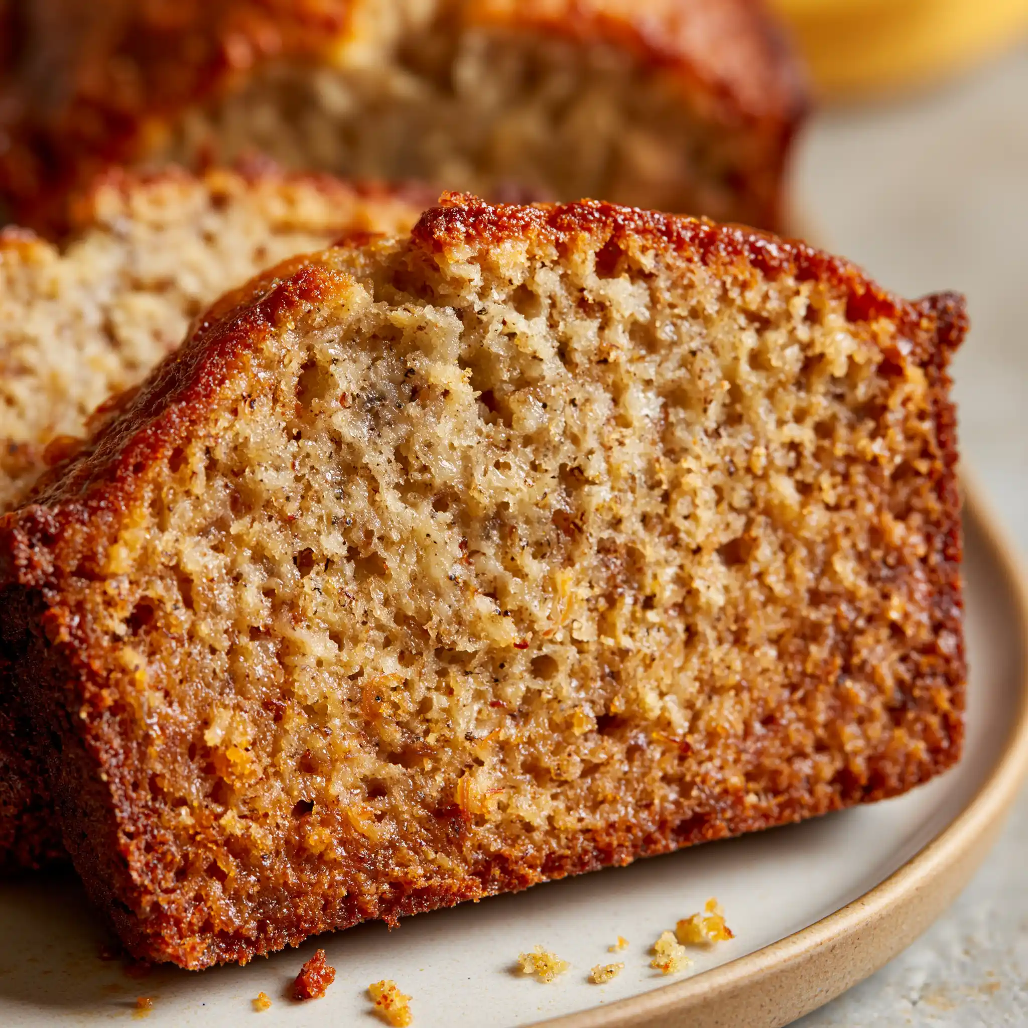 Close-up of soft banana bread slices showing a tender moist crumb